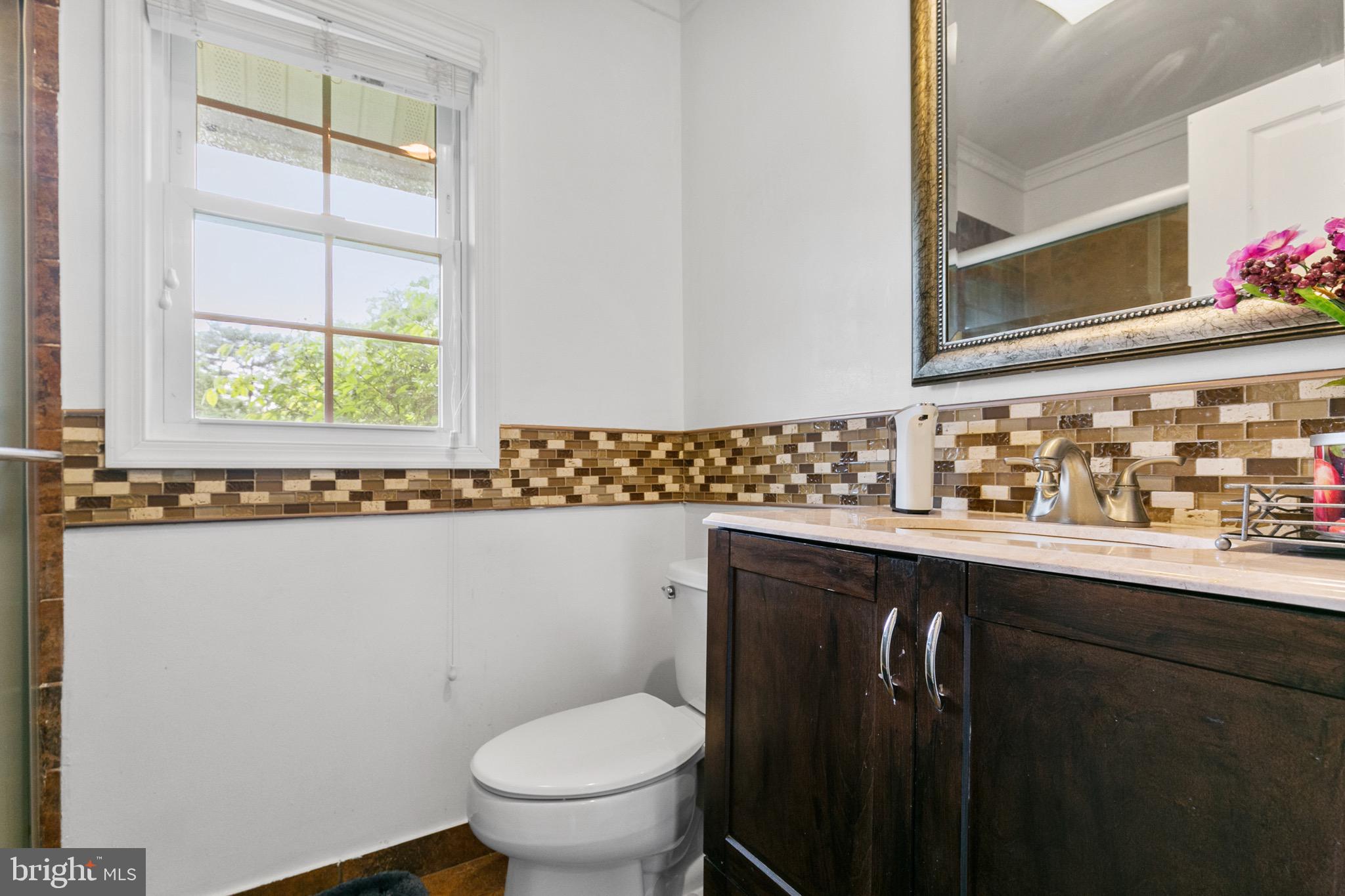 68 Shawmont Lane Willingboro, NJ 08046 - Photo 15 of 25 a bathroom with a sink and a toilet