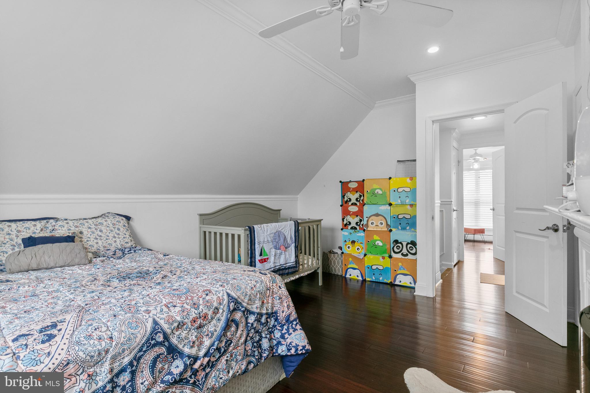 68 Shawmont Lane Willingboro, NJ 08046 - Photo 20 of 25 a bedroom with a bed and wooden floor