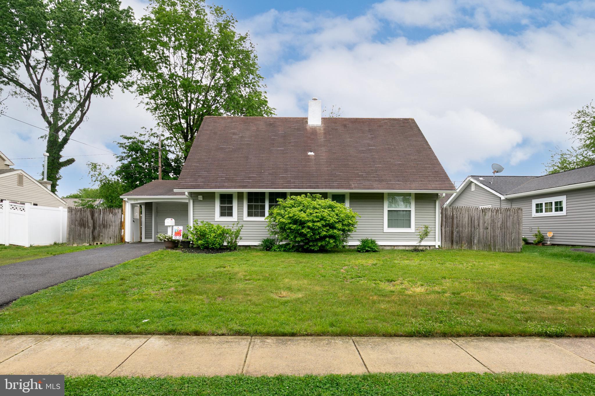 68 Shawmont Lane Willingboro, NJ 08046 - Photo 2 of 25 a view of a yard in front of house