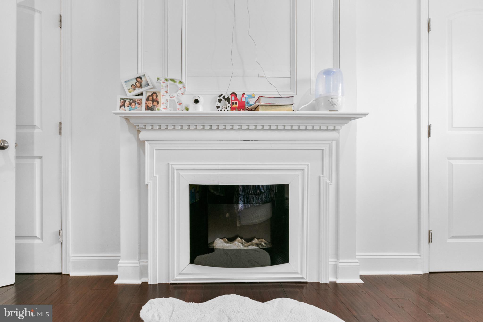 68 Shawmont Lane Willingboro, NJ 08046 - Photo 21 of 25 a view of a living room that has a fireplace