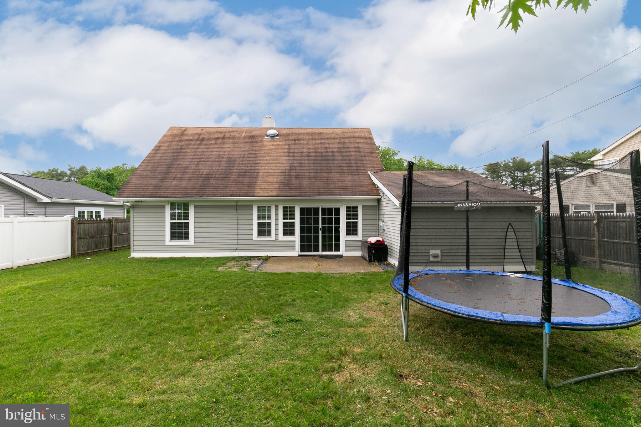 68 Shawmont Lane Willingboro, NJ 08046 - Photo 23 of 25 a view of a house with a backyard