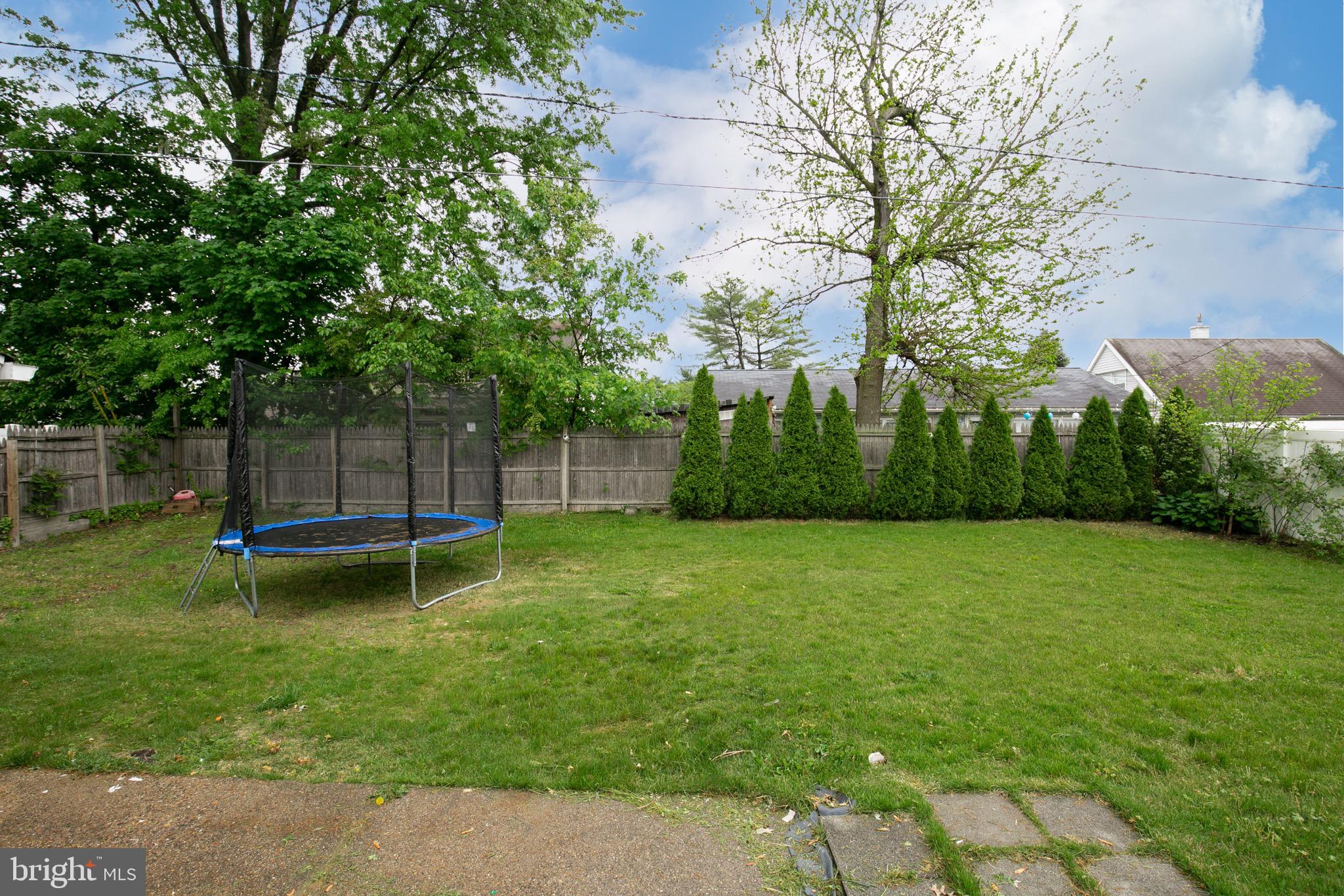 68 Shawmont Lane Willingboro, NJ 08046 - Photo 25 of 25 a swimming pool with lots of tress in front of it