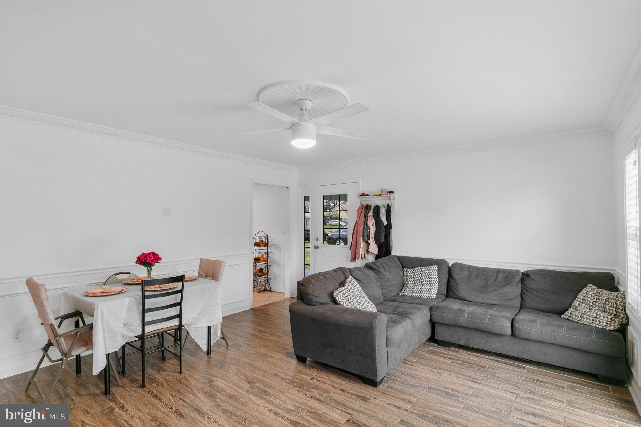 68 Shawmont Lane Willingboro, NJ 08046 - Photo 4 of 25 a living room with furniture and a wooden floor
