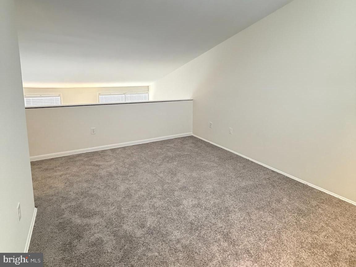 5485 Harpers Farm Road, Unit L6 Columbia, MD 21044 - Photo 10 of 20 an empty room