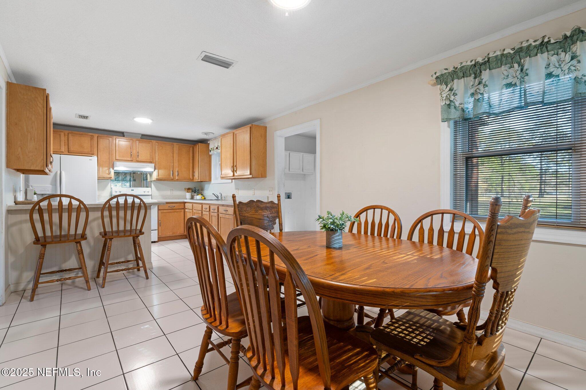 15723 Parete Road Jacksonville, FL 32218 - Photo 13 of 36 Dining Room to Kitchen
