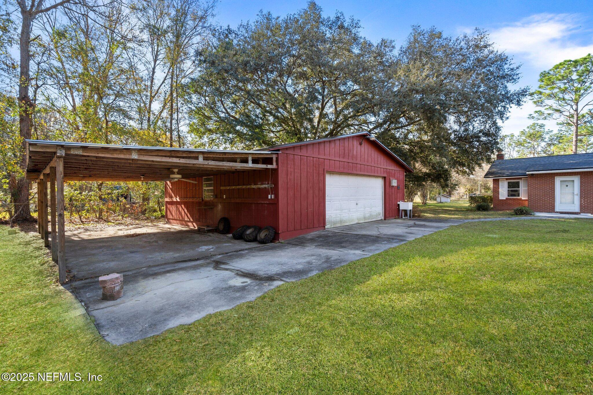 15723 Parete Road Jacksonville, FL 32218 - Photo 27 of 36 Detached Garage with Carport