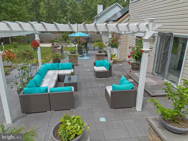 an aerial view of a house with a garden
