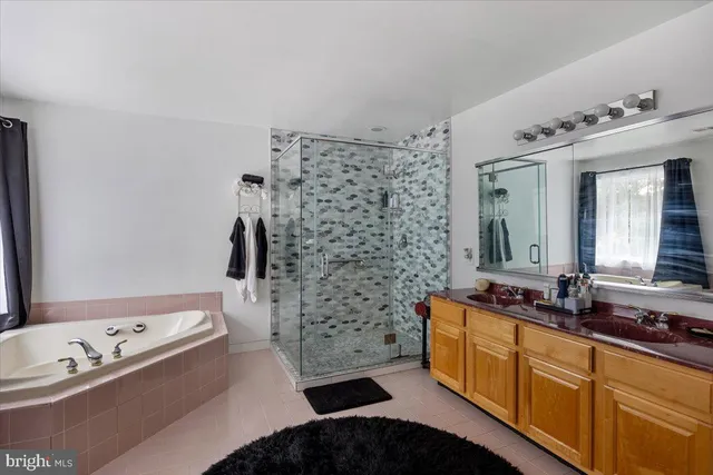 a bedroom with bed chair and window