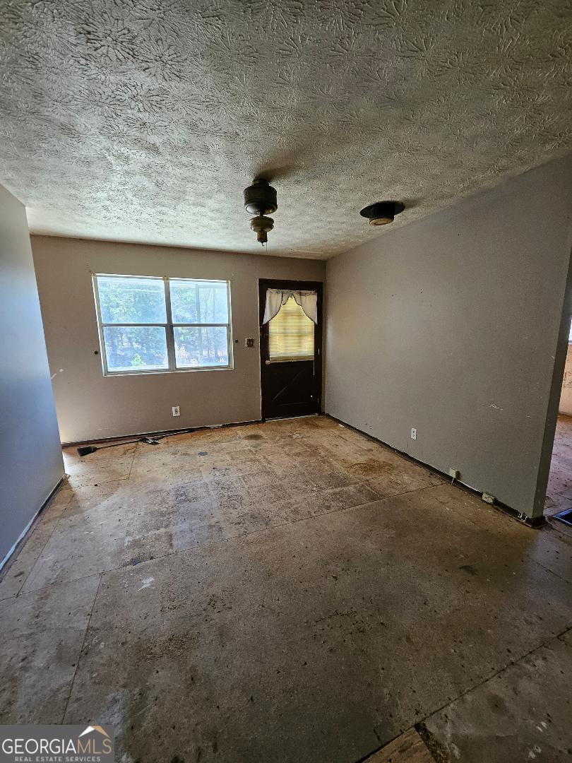 914 Chubbtown Road Cedartown, GA 30125 - Photo 7 of 11 an empty room with windows
