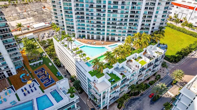 a view of water with a tall building