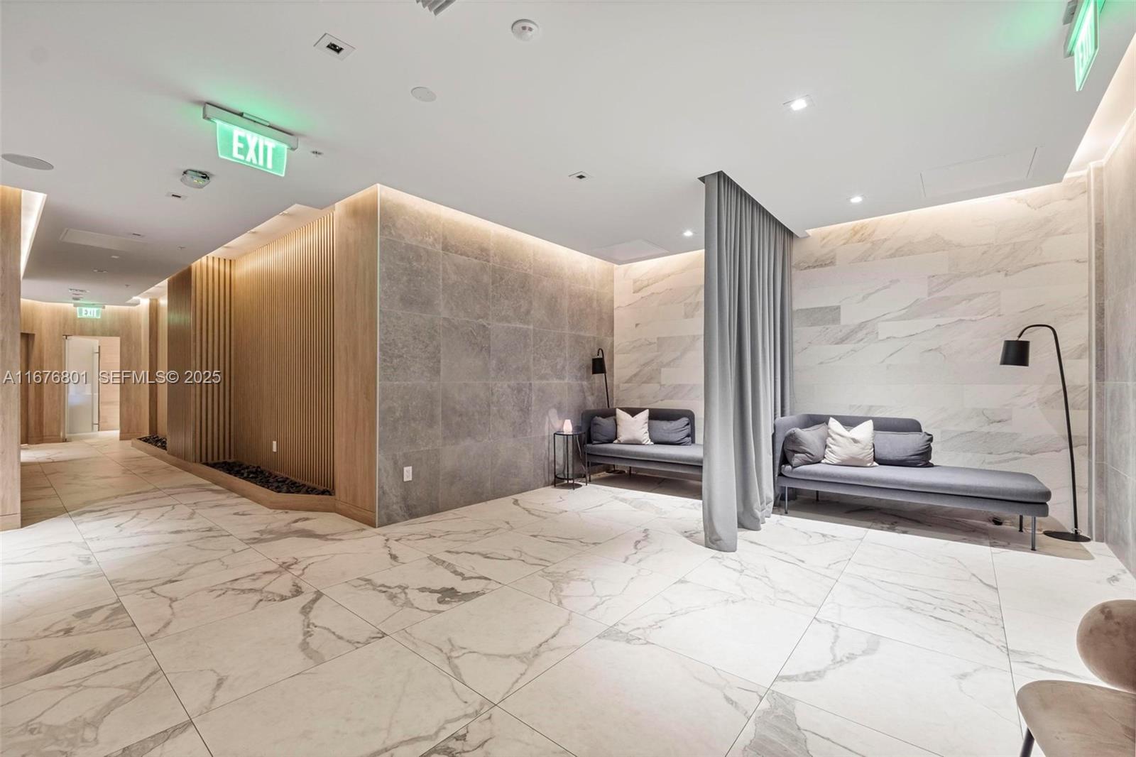 90 Southwest 3rd Street, Unit 1416 Miami, FL 33130 - Photo 29 of 31 a en suite bathroom with a large mirror