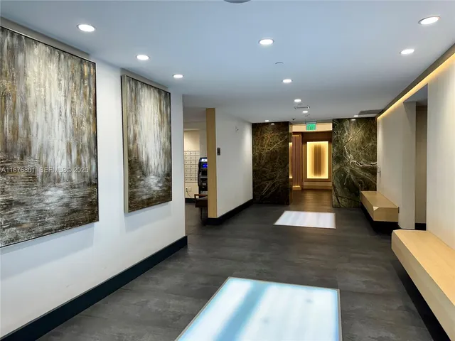 a view of entryway with wooden floor and garden