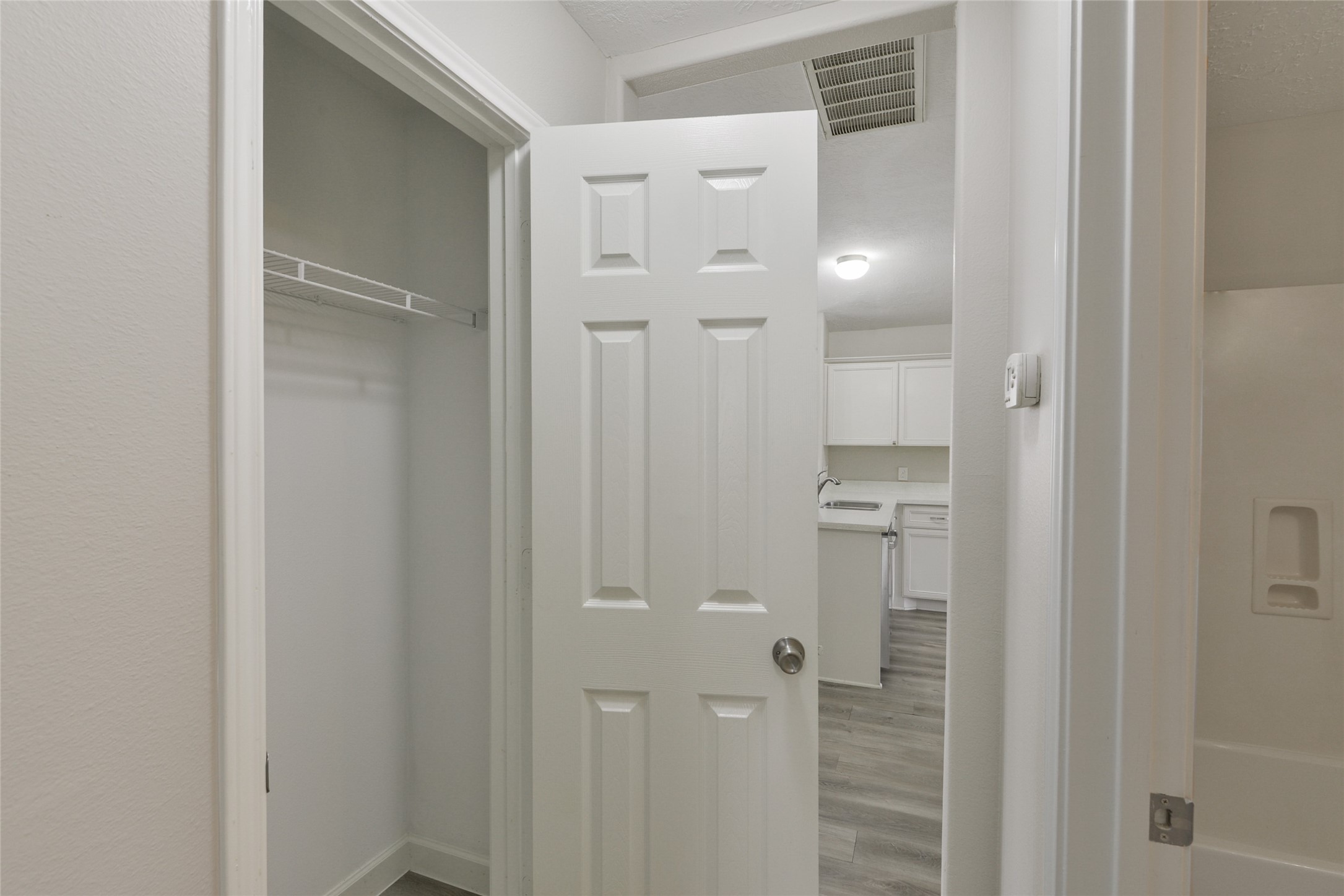 13027 Lark Point Court Houston, TX 77044 - Photo 18 of 29 a bathroom with a glass shower door