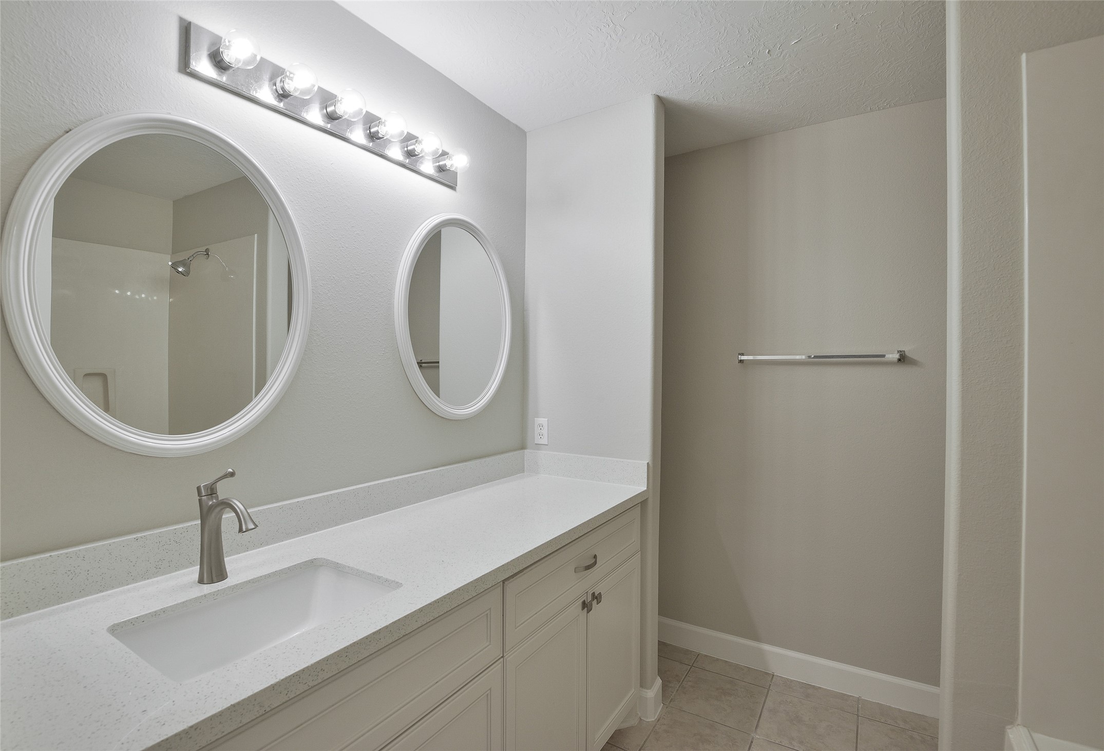 13027 Lark Point Court Houston, TX 77044 - Photo 26 of 29 a bathroom with a sink and a mirror