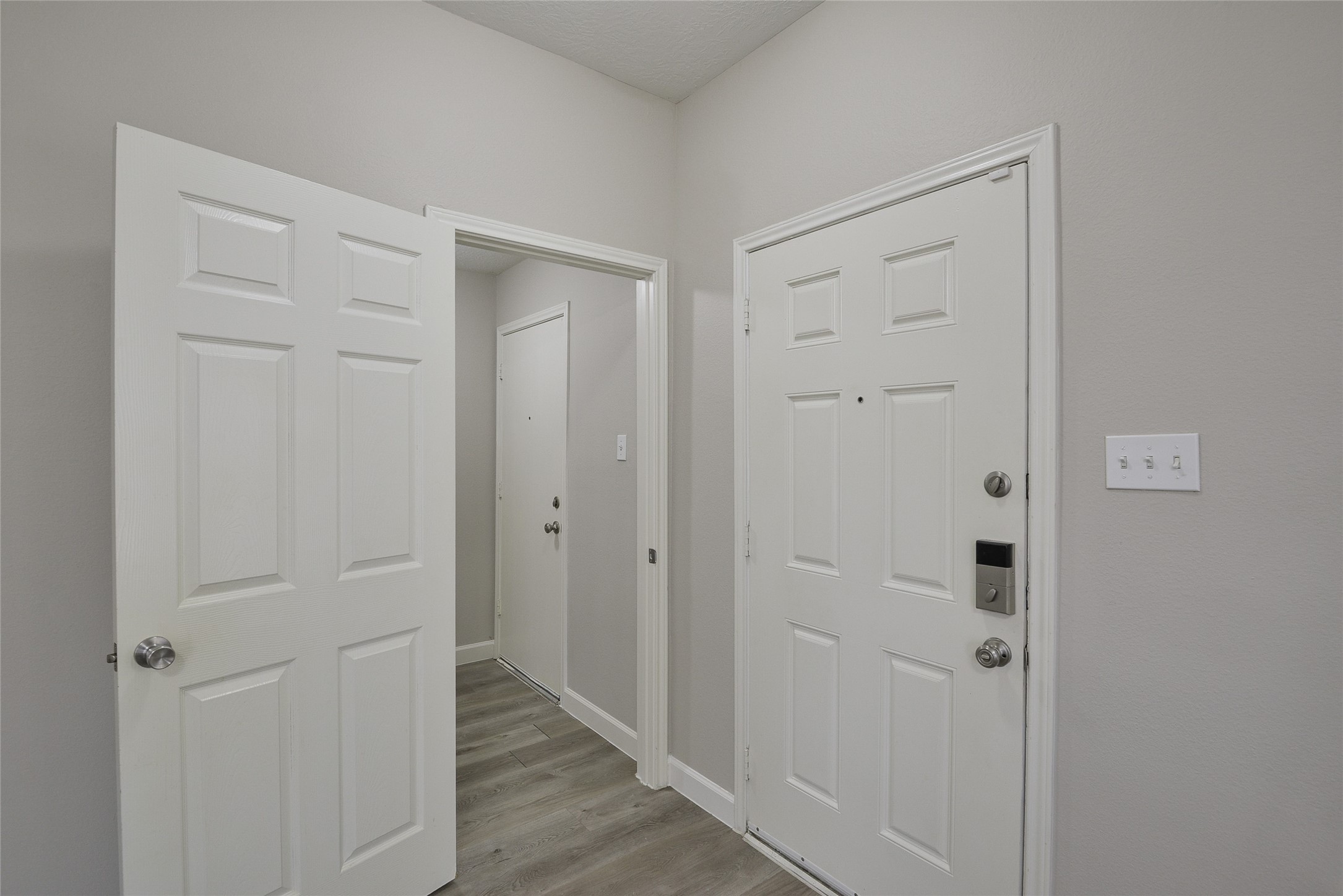 13027 Lark Point Court Houston, TX 77044 - Photo 3 of 29 a view of a hallway with wooden floor