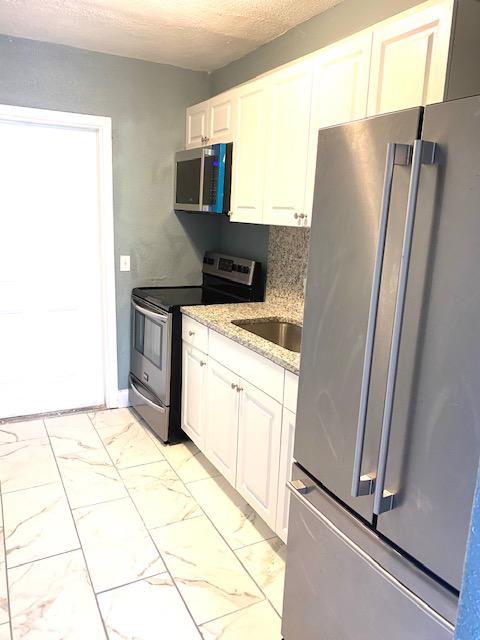 1117 West 34th Street Riviera Beach, FL 33404 - Photo 16 of 20 9402D8C5-D070-454B-972D-CE35DDA40037