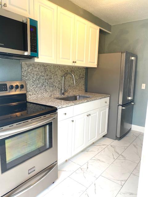 1117 West 34th Street Riviera Beach, FL 33404 - Photo 17 of 20 9F307AB2-95D8-48B7-AD78-E2ECA28332A7