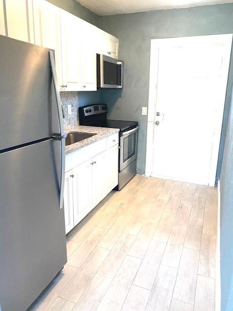 1117 West 34th Street Riviera Beach, FL 33404 - Photo 4 of 20 F6C3BF05-2DB7-4B20-ABF1-617B40B2BC25