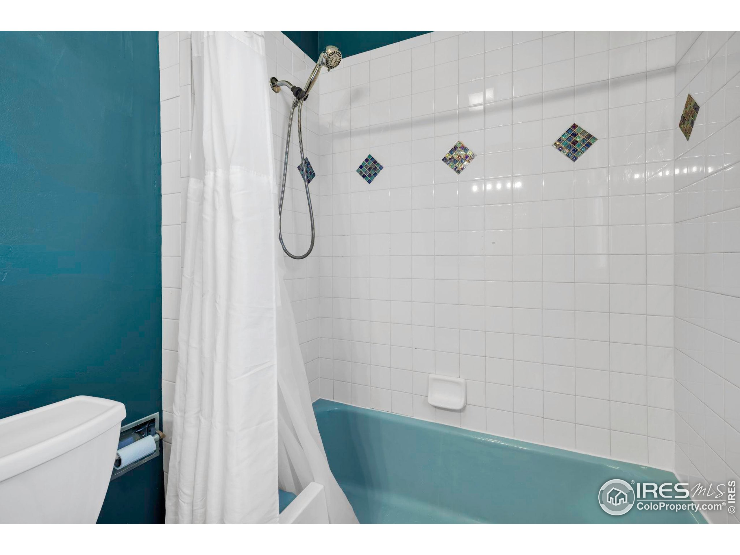 409 Main Street Mead, CO 80542 - Photo 18 of 35 a bathroom with a shower