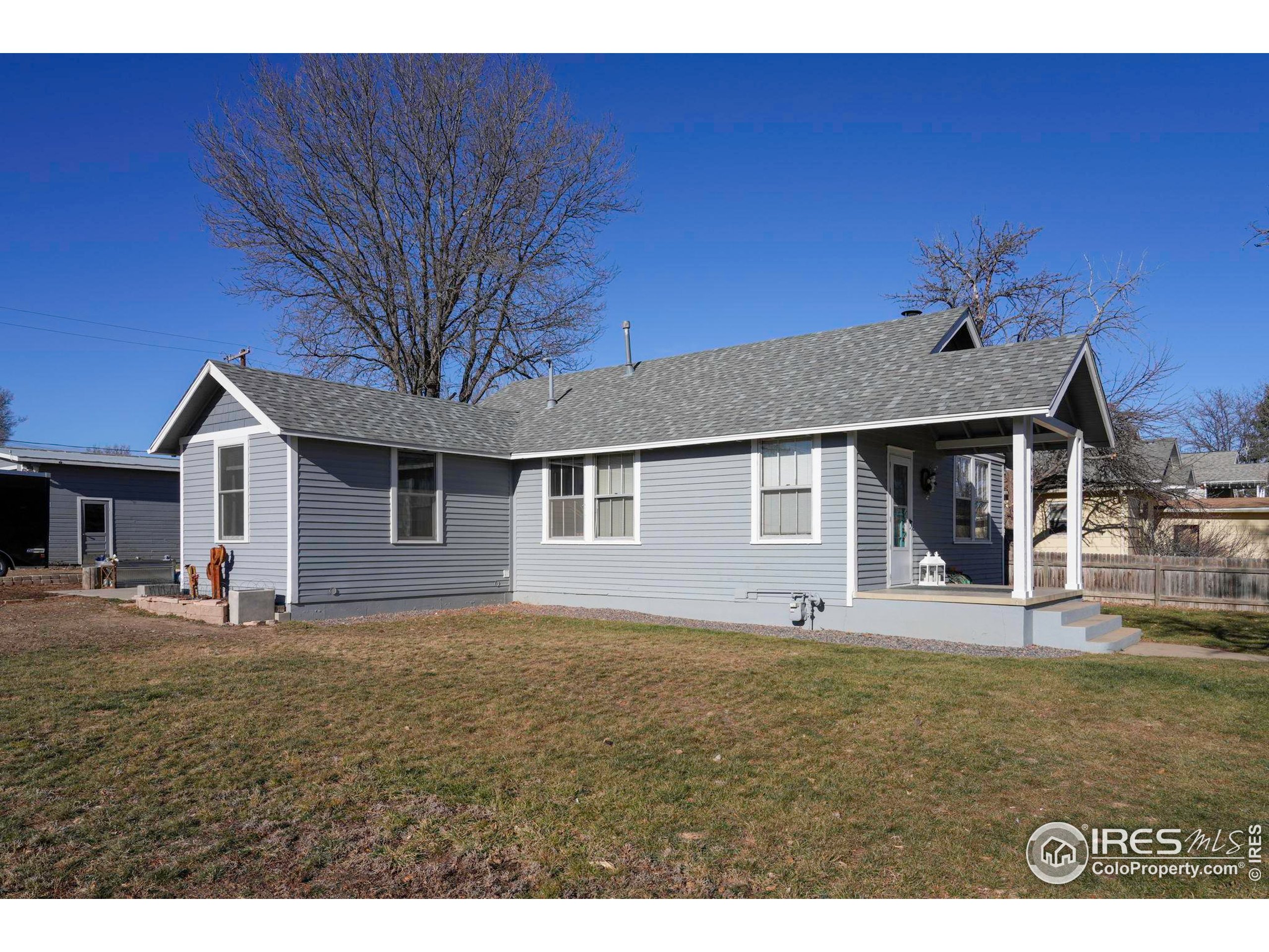 409 Main Street Mead, CO 80542 - Photo 20 of 35 a house view with a garden space