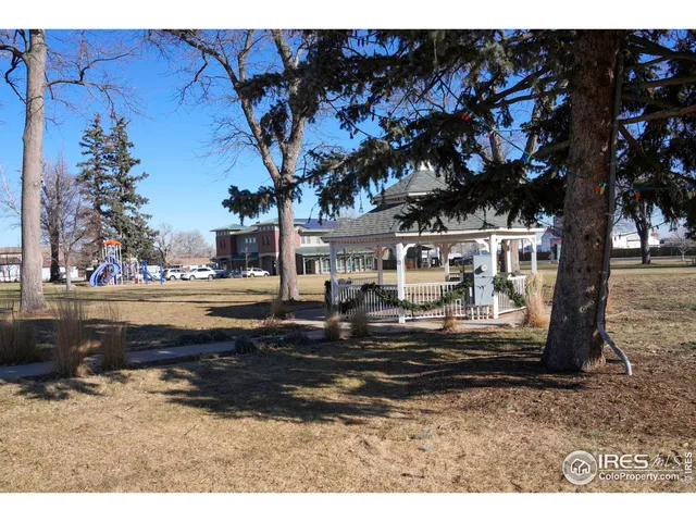 a view of building with trees in the background
