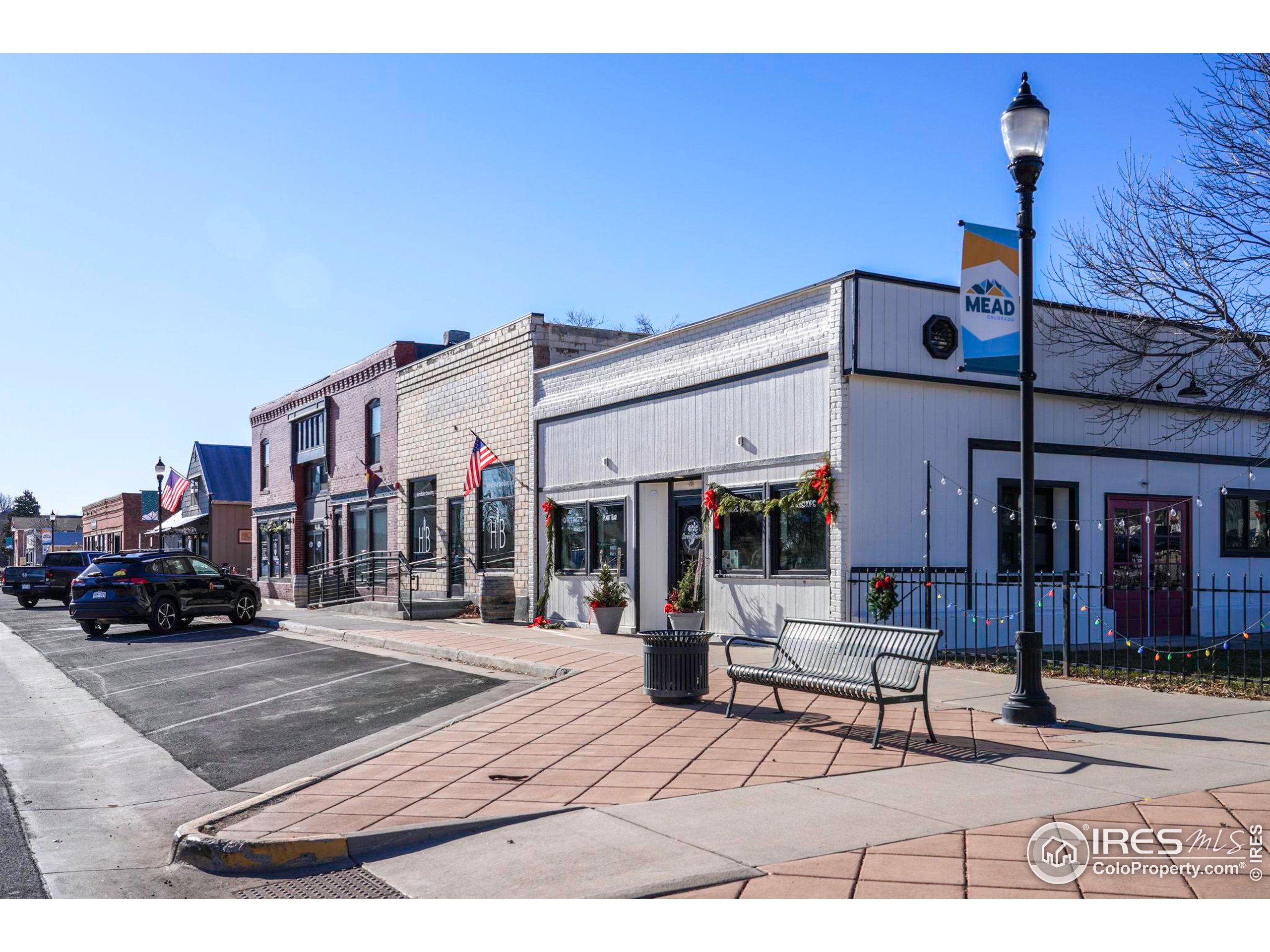 409 Main Street Mead, CO 80542 - Photo 33 of 35 a black and white photo of a building