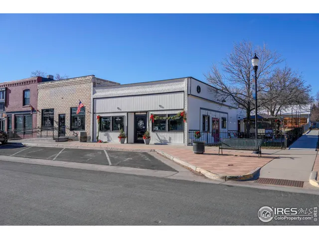 a view of a building with a street