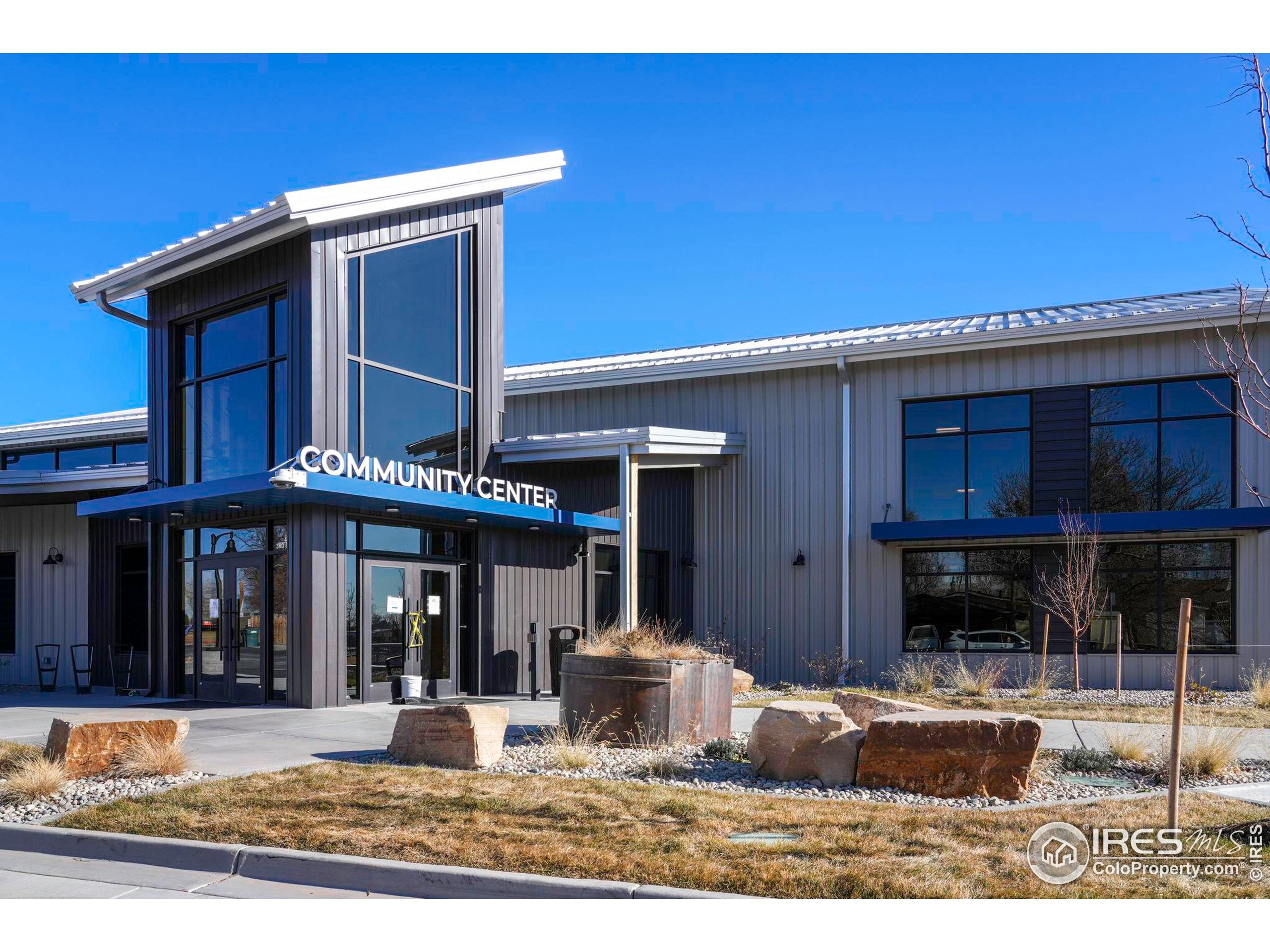 409 Main Street Mead, CO 80542 - Photo 35 of 35 a front view of a house with garden
