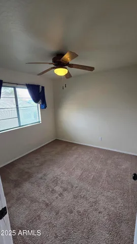 a kitchen with stainless steel appliances granite countertop a sink and a stove