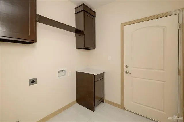 a bathroom with a shower and a sink