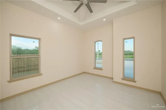 an empty room with windows