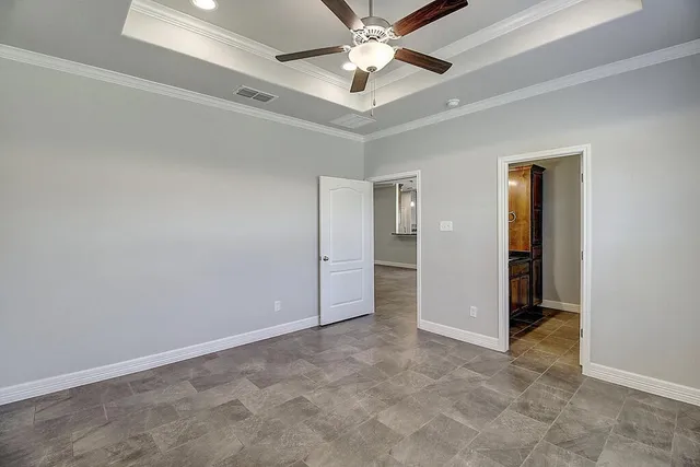 a bathroom with double sink and a mirror