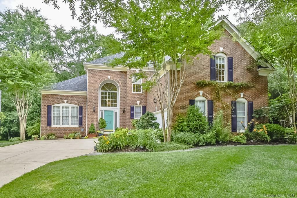 3513 Rhett Butler Place Charlotte, NC 28270 - Photo 1 of 24 front view of a house next to a yard