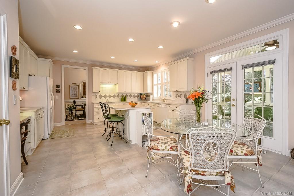 3513 Rhett Butler Place Charlotte, NC 28270 - Photo 12 of 24 a view of a dining room with furniture window and wooden floor