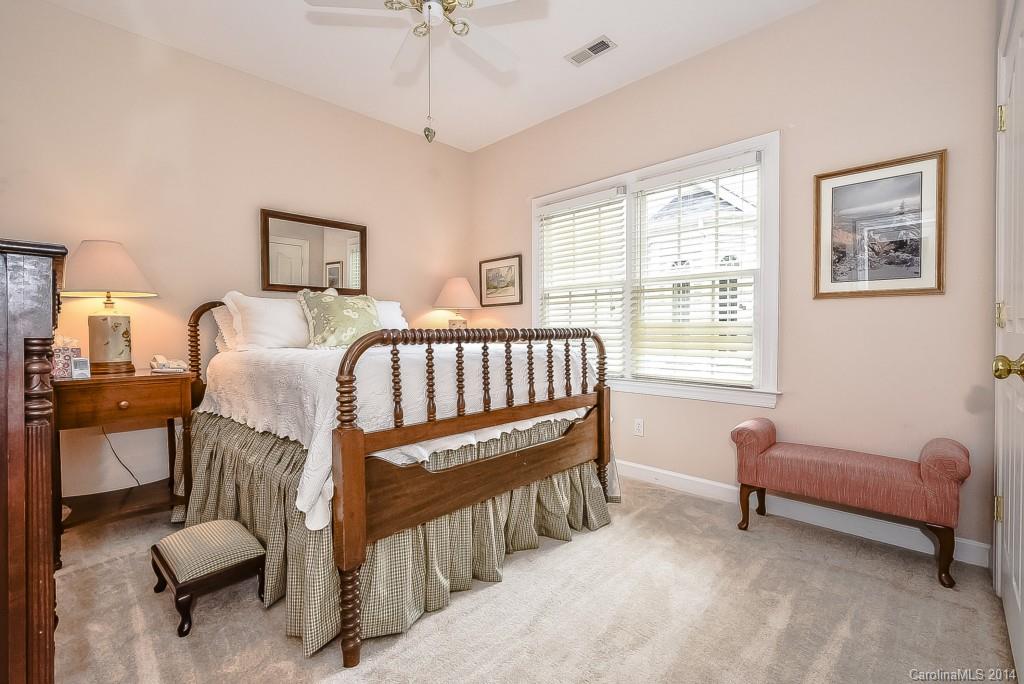 3513 Rhett Butler Place Charlotte, NC 28270 - Photo 17 of 24 a bedroom with furniture and a window