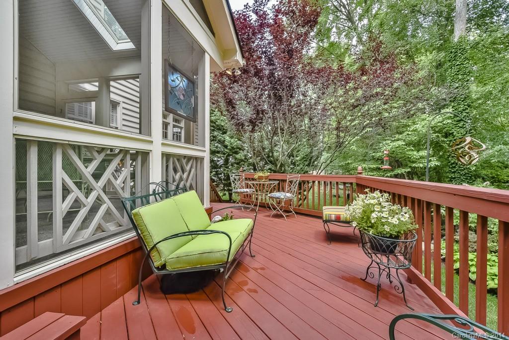 3513 Rhett Butler Place Charlotte, NC 28270 - Photo 21 of 24 a view of a deck with two chair and wooden floor