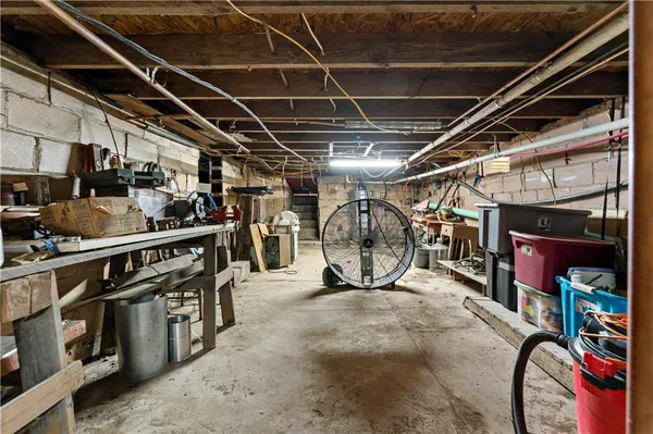 a room with furniture and wooden floor