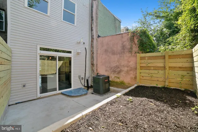 a view of a back yard of the house