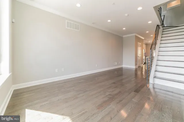 a view of entryway with wooden floor