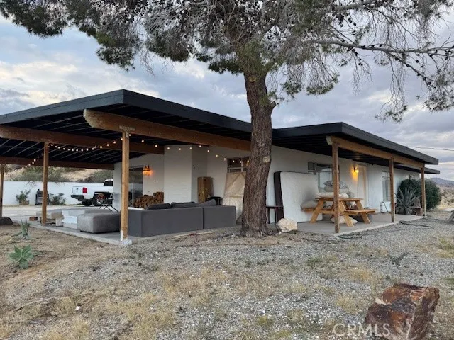 a front view of a house with patio