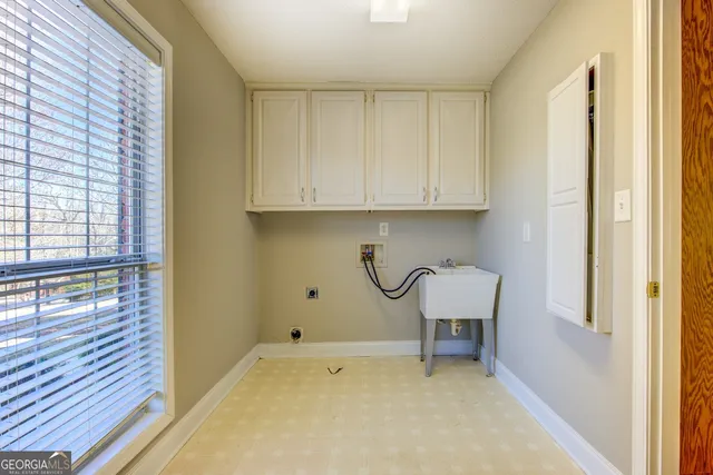 a view of a room with table and chair