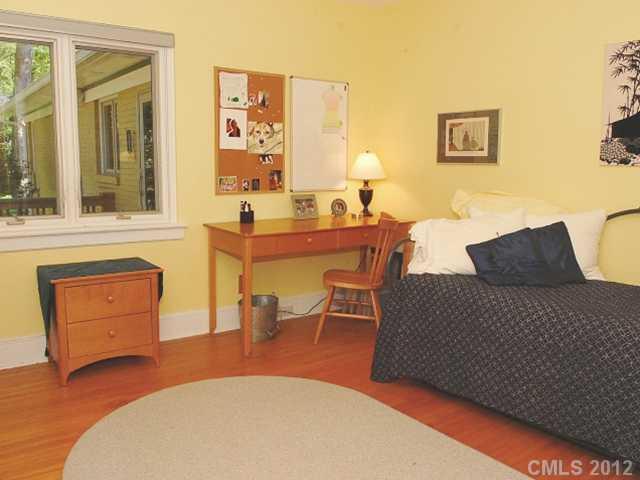 1521 Andover Road Charlotte, NC 28211 - Photo 14 of 16 a living room with furniture and a dresser