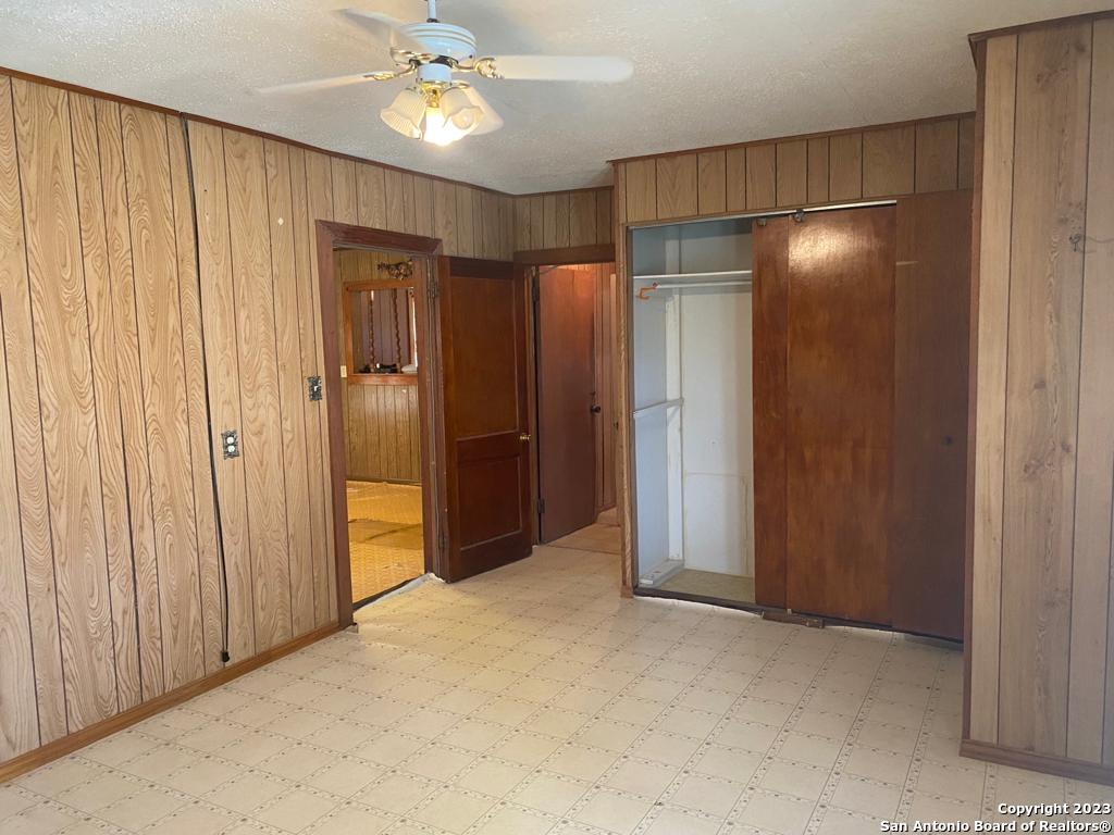 17770 Interstate 35 Lytle, TX 78052 - Photo 14 of 32 an empty room with closet and entryway