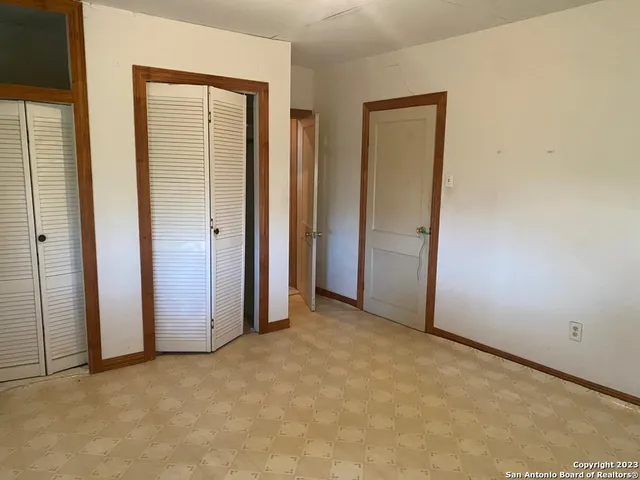 an empty room with closet