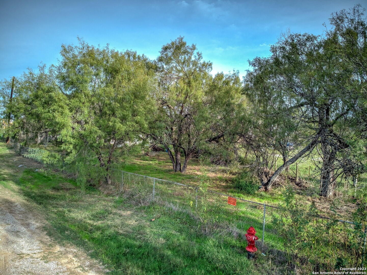 17770 Interstate 35 Lytle, TX 78052 - Photo 24 of 32 a green field with lots of trees in it