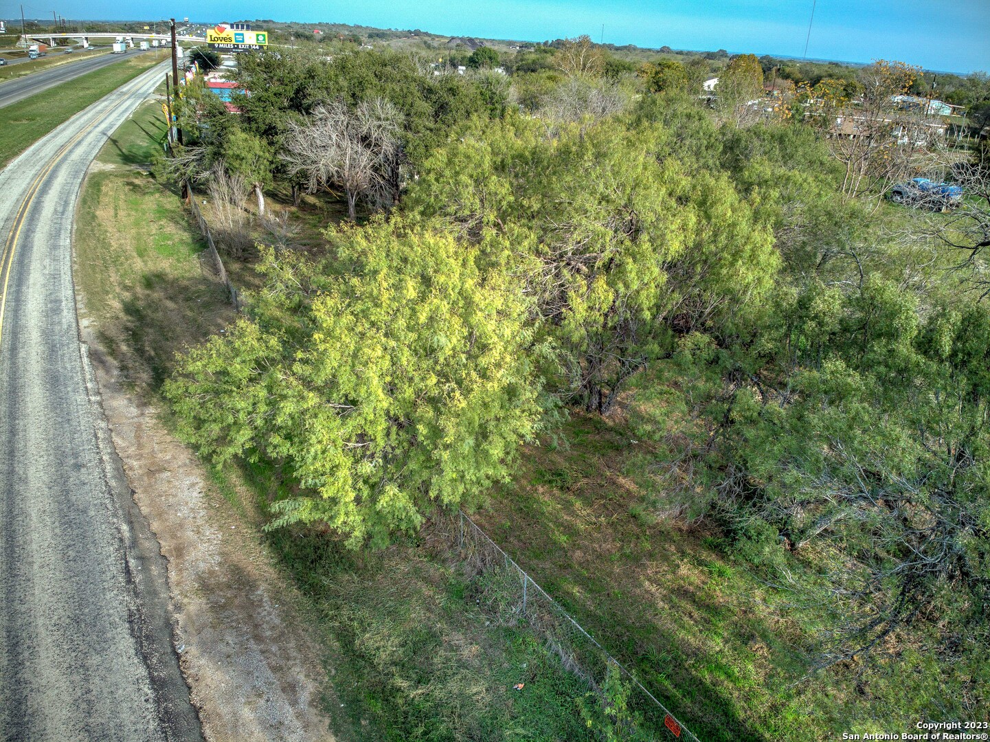 17770 Interstate 35 Lytle, TX 78052 - Photo 25 of 32 a view of a forest with a street