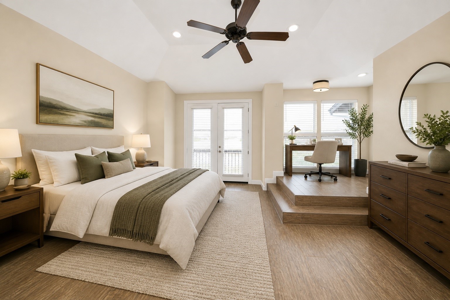 2830 Polk Street Houston, TX 77003 - Photo 15 of 21 On the top floor, the virtually staged primary suite offers a relaxing retreat with soaring vaulted ceilings, a ceiling fan, and a wall of windows that brighten the entire room. A dedicated sitting area or study nook adds extra flexibility and creates the perfect corner for reading, working, or simply unwinding at the end of the day. French doors lead to a private balcony, adding another peaceful outdoor escape and giving the suite an elevated boutique-hotel feel.
