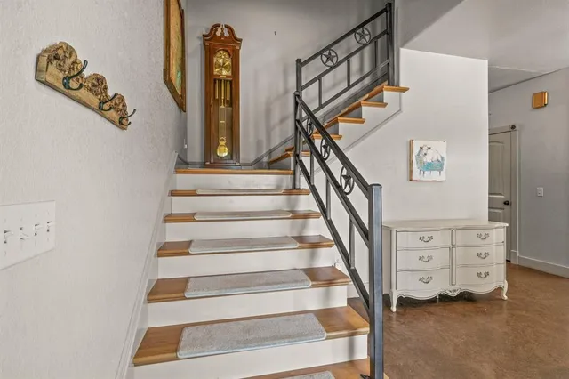 a view of an entryway with staircase