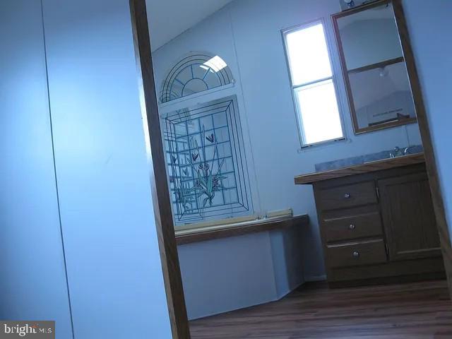 1910 Schubert Road, Unit 19 Bethel, PA 19507 - Photo 7 of 14 a view of front door with wooden floor