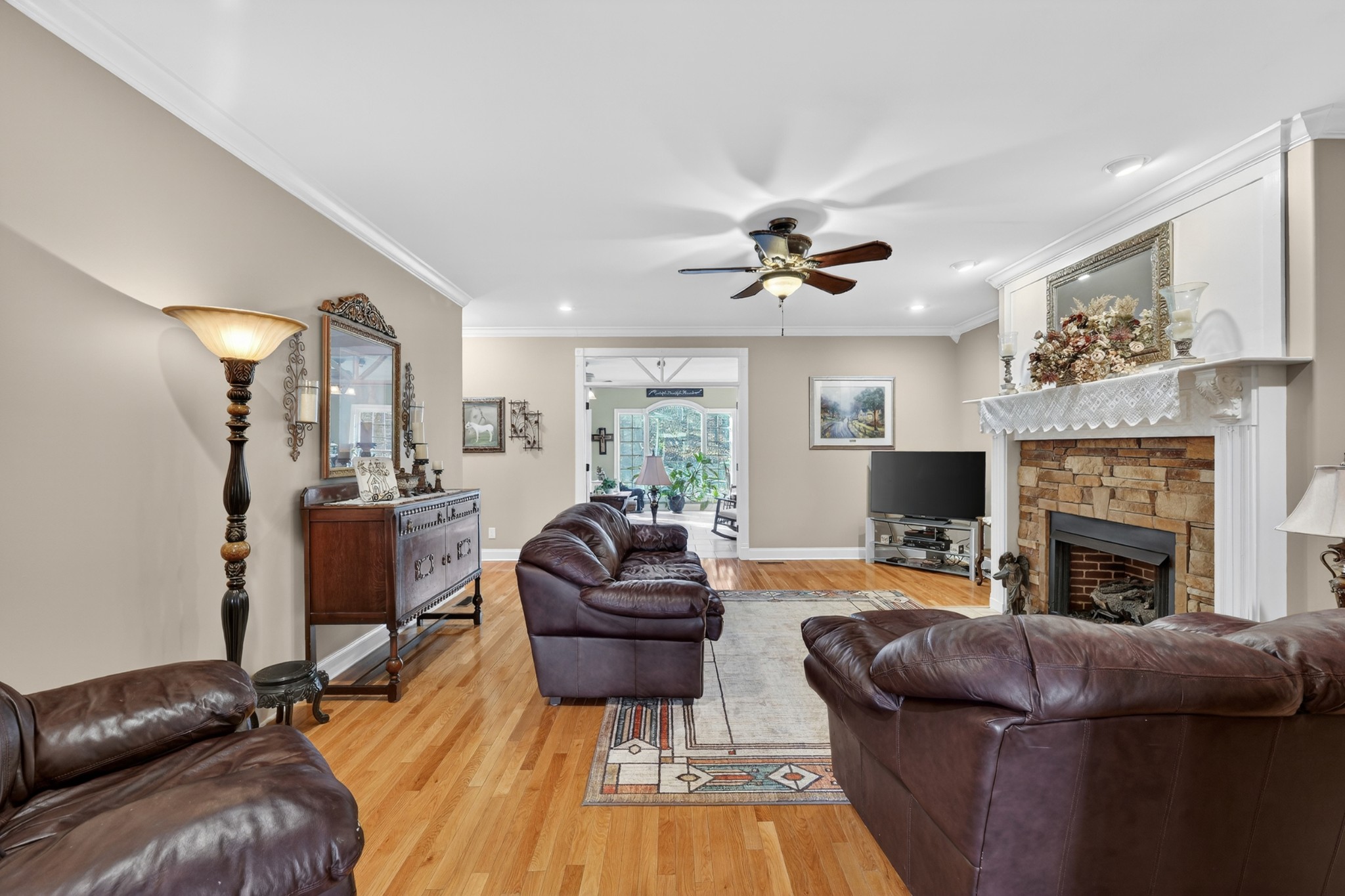 600 Bates Hollow Road Prospect, TN 38477 - Photo 24 of 68 a living room with furniture and a fireplace